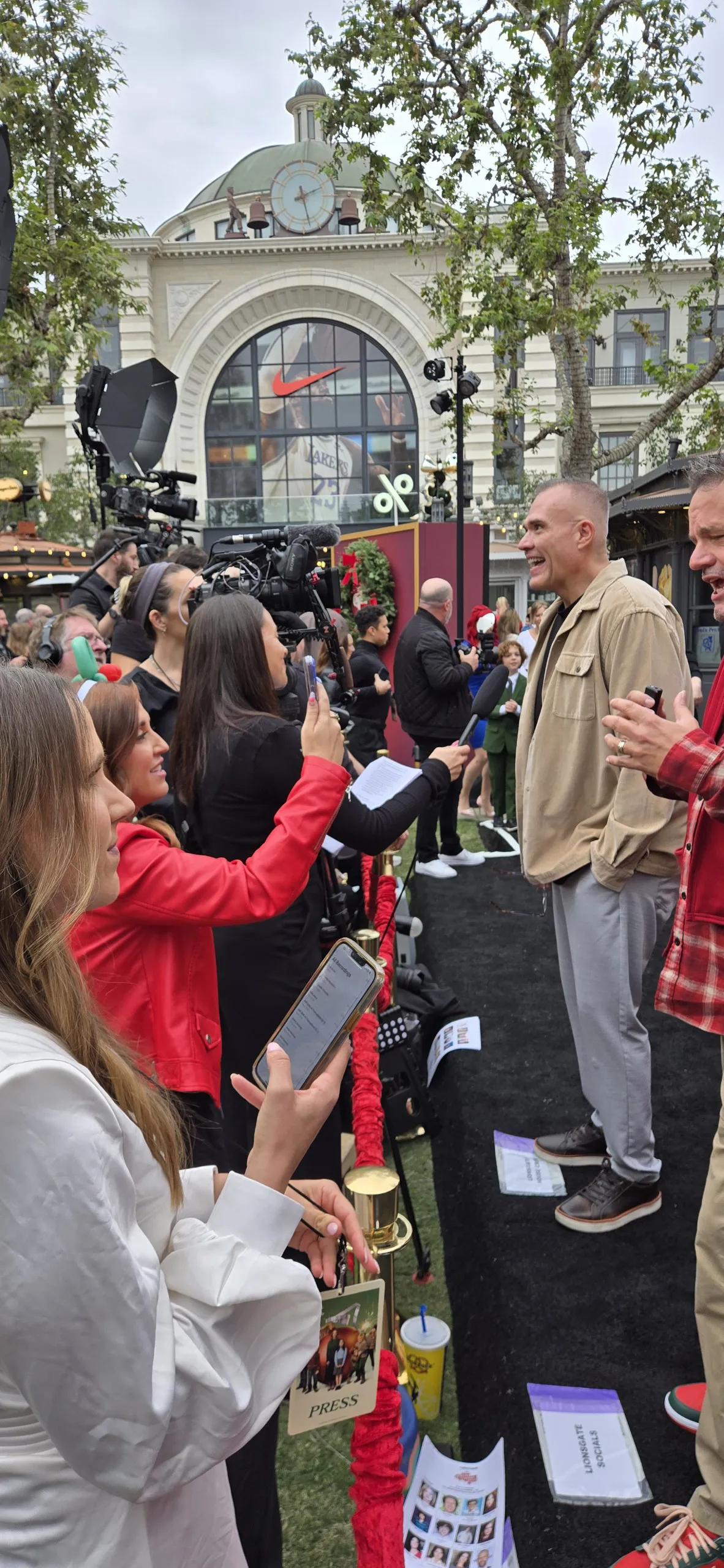 Platte F. Clark being interviewed by the press line on the red carpet at the Lionsgate premiere of The Best Christmas Pageant Ever